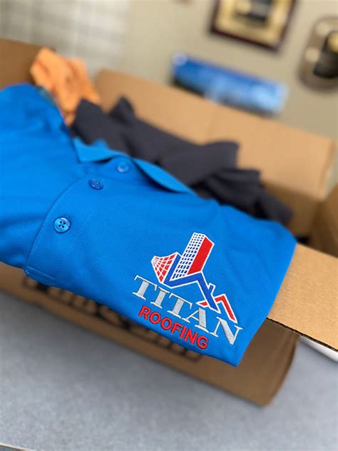 Embroidered branded crew polo shirts packed for delivery to a construction company
