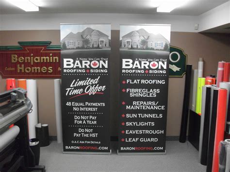 Retractable roofing trade show banners with services and offers