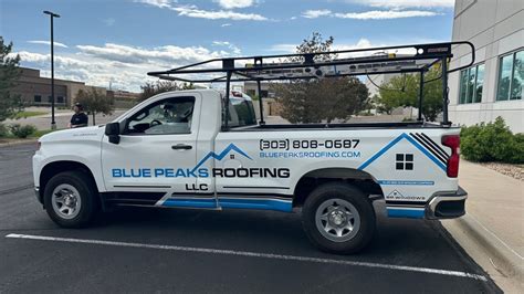 Construction contractor pickup truck with full branded vehicle wrap